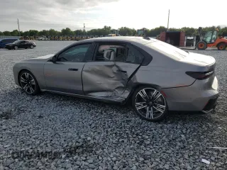 2024 BMW 7 Series 740i z VIN WBA23EH08RCS95536, wystawiony jako Copart lot #52499895 z przebiegiem 3 826 mil mil oraz Nie do naprawy • Non repairable. Historia ofert i sprzedaży dostępna na DreamBid. Obrazek 2.