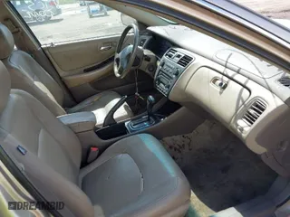 2002 Honda Accord Sdn SE with VIN 1HGCG66812A155003, listed as a IAAI auction lot 41934724 with 192,129 mi miles. Bid and sale history available at carsss.com. Image 5.