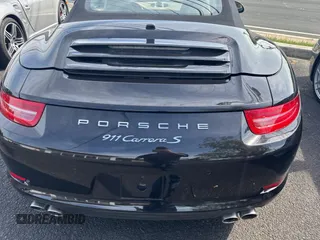 2013 Porsche 911 Carrera S with VIN WP0CB2A97DS154165, listed as a Copart auction lot 56958415 with 99,999 mi miles and Salvage Title. Bid and sale history available at DreamBid. Image 7.