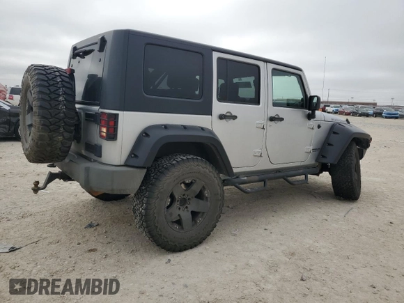 2009 Jeep Wrangler Unlimited Rubicon with VIN 1J8GA69169L731787, listed as a Copart auction lot 44604125 with 180,861 mi miles and Salvage title. Bid and sale history available at DreamBid. Image 3.