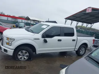 2015 Ford F-150 XLT with VIN 1FTEW1E80FFB30827, listed as a IAAI auction lot 41961072 with 155,206 mi miles and . Bid and sale history available at DreamBid. Image 14.