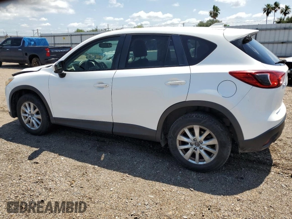 2014 Mazda CX-5 Touring with VIN JM3KE2CY9E0305244, listed as a Copart auction lot 56205605 with 164,516 mi miles and Salvage Title. Bid and sale history available at DreamBid. Image 2.