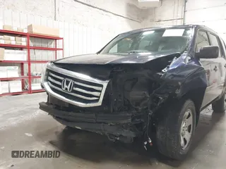 2014 Honda Pilot LX with VIN 5FNYF4H28EB015045, listed as a IAAI auction lot 40132499 with 139,845 mi miles and . Bid and sale history available at DreamBid. Image 6.