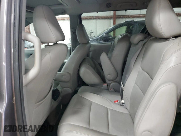 2015 Toyota Sienna XLE с VIN 5TDYK3DC4FS650605, выставлен на аукционе Copart как лот 58217575 с пробегом 174 364 миль миль и Списание • Salvage title. История ставок и продаж доступна на DreamBid. Изображение 11.