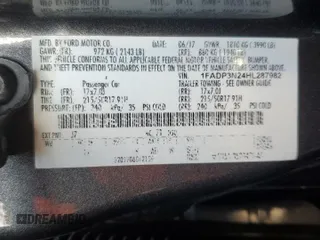 2017 Ford Focus Titanium with VIN 1FADP3N24HL287982, listed as a Copart auction lot 88100515 with 103,615 mi miles and Salvage Title. Bid and sale history available at carsss.com. Image 12.