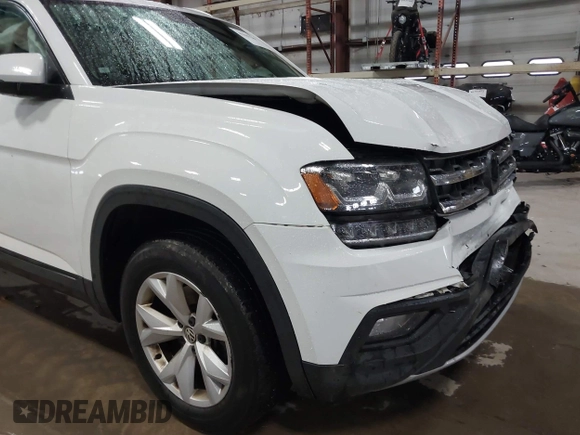 2018 Volkswagen Atlas SE with VIN 1V2KR2CA2JC569381, listed as a IAAI auction lot 41843200 with 87,769 mi miles and . Bid and sale history available at DreamBid. Image 6.