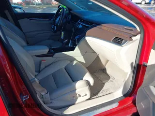 2014 Cadillac XTS Luxury z VIN 2G61N5S34E9163874, wystawiony jako IAAI lot #41649292 z przebiegiem 104 638 mil mil oraz . Historia ofert i sprzedaży dostępna na DreamBid. Obrazek 5.