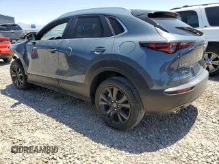 2023 Mazda CX-30 S Carbon Edition z VIN 3MVDMBCM2PM524384, wystawiony jako Copart lot #62699155 z przebiegiem 25 765 mil mil oraz Szkoda całkowita • Salvage title. Historia ofert i sprzedaży dostępna na DreamBid. Obrazek 2.