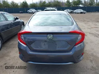 2019 Honda Civic LX with VIN 19XFC2F61KE037495, listed as a IAAI auction lot 41891007 with 90,262 mi miles and . Bid and sale history available at DreamBid. Image 16.
