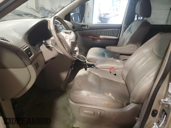 2009 Toyota Sienna XLE with VIN 5TDZK22C19S228023, listed as a Copart auction lot 57072295 with 148,080 mi miles and Salvage title. Bid and sale history available at DreamBid. Image 7.
