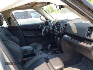 2020 MINI Countryman Cooper S with VIN WMZYX1C08L3L66257, listed as a IAAI auction lot 42402345 with 28,609 mi miles and . Bid and sale history available at DreamBid. Image 5.