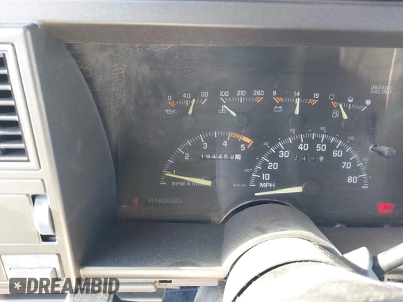 1994 GMC Sierra 1500 z VIN 2GTEK19HXR1563542, wystawiony jako IAAI lot #41733737 z przebiegiem 194 469 mil mil oraz . Historia ofert i sprzedaży dostępna na DreamBid. Obrazek 7.
