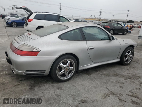 2004 Porsche 911 Carrera z VIN WP0AA29904S623031, wystawiony jako Copart lot #76551074 z przebiegiem 145 478 mil mil oraz Szkoda całkowita • Salvage title. Historia ofert i sprzedaży dostępna na DreamBid. Obrazek 3.
