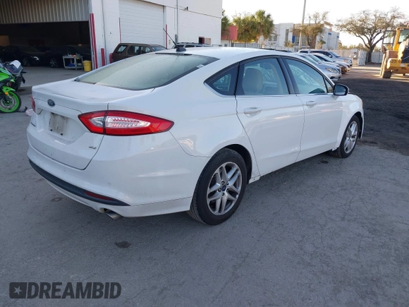 2016 Ford Fusion SE with VIN 3FA6P0H71GR243369, listed as a IAAI auction lot 41586316 with 161,009 mi miles. Bid and sale history available at carsss.com. Image 4.