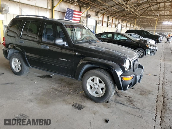 2003 Jeep Liberty Limited with VIN 1J4GL58K13W657703, listed as a Copart auction lot 62957105 with 168,201 mi miles and Salvage title. Bid and sale history available at DreamBid. Image 4.