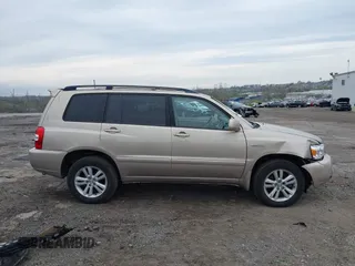 2006 Toyota Highlander Hybrid with VIN JTEEW21AX60007243, listed as a IAAI auction lot 42032134 with 154,901 mi miles. Bid and sale history available at carsss.com. Image 13.