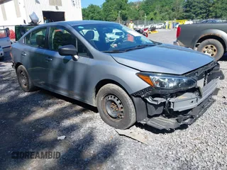 2019 Subaru Impreza with VIN 4S3GKAA60K3623167, listed as a IAAI auction lot 42565303 with 51,774 mi miles and . Bid and sale history available at DreamBid. Image 1.