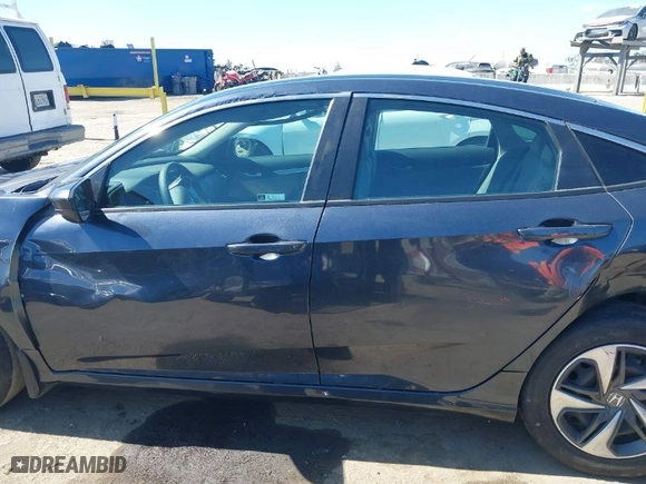 2021 Honda Civic Sedan LX with VIN 2HGFC2F68MH547304, listed as a IAAI auction lot 41719060 with 47,431 mi miles. Bid and sale history available at carsss.com. Image 14.