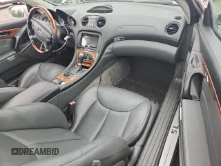 2005 Mercedes-Benz SL 500 with VIN WDBSK75F65F093215, listed as a Copart auction lot 63744135 with 94,645 mi miles and Salvage title. Bid and sale history available at DreamBid. Image 8.