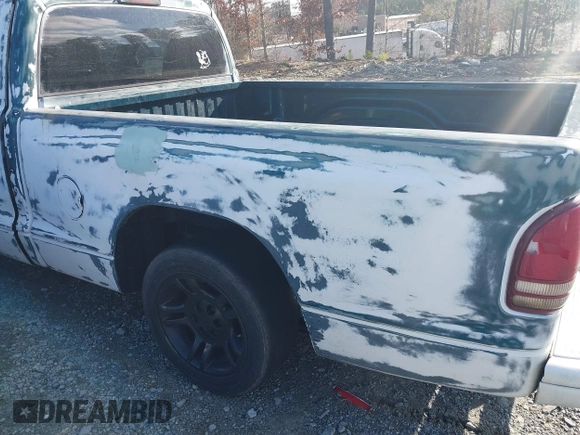 1998 Dodge Dakota SLT z VIN 1B7FL26X7WS586596, wystawiony jako IAAI lot #41745358 z przebiegiem 173 950 mil mil oraz . Historia ofert i sprzedaży dostępna na DreamBid. Obrazek 15.