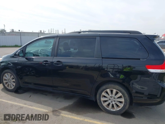 2012 Toyota Sienna LE with VIN 5TDJK3DC0CS037989, listed as a IAAI auction lot 41622546 with 165,363 mi miles. Bid and sale history available at carsss.com. Image 15.