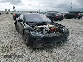 2023 Tesla Model S Plaid with VIN 5YJSA1E67PF511354, listed as a Copart auction lot 56648975 with 69,002 mi miles and Salvage title. Bid and sale history available at DreamBid. Image 14.