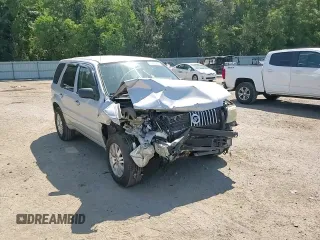 2005 Mercury Mariner Luxury z VIN 4M2YU56165DJ21260, wystawiony jako Copart lot #67528354 z przebiegiem Nie podano mil oraz Szkoda całkowita • Salvage title. Historia ofert i sprzedaży dostępna na DreamBid. Obrazek 11.