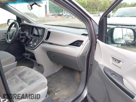 2015 Toyota Sienna L with VIN 5TDZK3DC8FS678539, listed as a IAAI auction lot 42115498 with 111,417 mi miles and . Bid and sale history available at DreamBid. Image 5.
