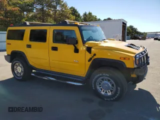 2003 Hummer H2 with VIN 5GRGN23U23H148715, listed as a Copart auction lot 72237543 with 188,726 mi miles and Clean Title. Bid and sale history available at carsss.com. Image 4.