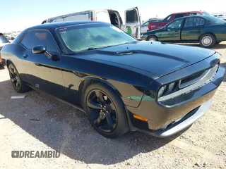 2013 Dodge Challenger SXT z VIN 2C3CDYAG0DH539476, wystawiony jako IAAI lot #41849456 z przebiegiem 166 031 mil mil oraz . Historia ofert i sprzedaży dostępna na DreamBid. Obrazek 1.