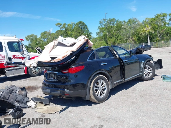 2014 Infiniti QX70 с VIN JN8CS1MU7EM451585, выставлен на аукционе IAAI как лот 41861091 с пробегом Не указан миль и . История ставок и продаж доступна на DreamBid. Изображение 4.