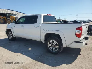 2016 Toyota Tundra 4WD Truck Platinum with VIN 5TFAW5F11GX570994, listed as a Copart auction lot 71259634 with 199,537 mi miles and Salvage Title. Bid and sale history available at carsss.com. Image 2.