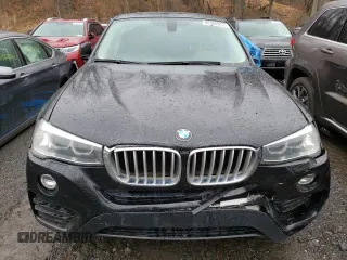 2015 BMW X4 xDrive28i with VIN 5UXXW3C54F0M89256, listed as a Copart auction lot 41388973 with 136,359 mi miles. Bid and sale history available at carsss.com. Image 5.