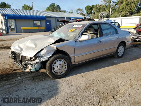 1997 Honda Accord Value with VIN 1HGCD5684VA168495, listed as a Copart auction lot 71716984 with 202,854 mi miles and Salvage Title. Bid and sale history available at DreamBid. Image 1.
