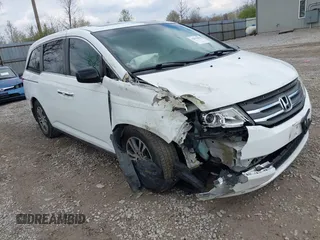 2012 Honda Odyssey EX-L with VIN 5FNRL5H67CB082903, listed as a IAAI auction lot 42015904 with 208,300 mi miles and . Bid and sale history available at carsss.com. Image 1.