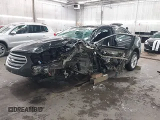 2015 Ford Taurus SEL with VIN 1FAHP2E81FG181897, listed as a IAAI auction lot 41598004 with Not Provided miles and . Bid and sale history available at carsss.com. Image 2.