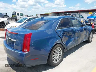 2010 Cadillac CTS Luxury with VIN 1G6DE5EG3A0115377, listed as a IAAI auction lot 42608919 with 191,657 mi miles and . Bid and sale history available at DreamBid. Image 4.