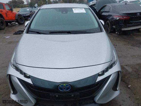2021 Toyota Prius Prime LE with VIN JTDKAMFP9M3188569, listed as a IAAI auction lot 41712793 with 144,722 mi miles. Bid and sale history available at carsss.com. Image 6.