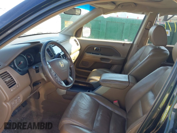 2006 Honda Pilot EX-L with VIN 5FNYF18766B008879, listed as a IAAI auction lot 41797763 with 398,242 mi miles and . Bid and sale history available at DreamBid. Image 5.