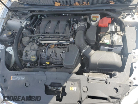 2019 Ford Taurus SEL z VIN 1FAHP2E89KG112921, wystawiony jako Copart lot #55276585 z przebiegiem 78 509 mil mil oraz Szkoda całkowita • Salvage title. Historia ofert i sprzedaży dostępna na DreamBid. Obrazek 11.