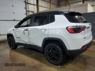 2023 Jeep Compass Trailhawk z VIN 3C4NJDDN1PT527851, wystawiony jako Copart lot #65566035 z przebiegiem 52 811 mil mil oraz Czysty tytuł • Clean title. Historia ofert i sprzedaży dostępna na DreamBid. Obrazek 2.