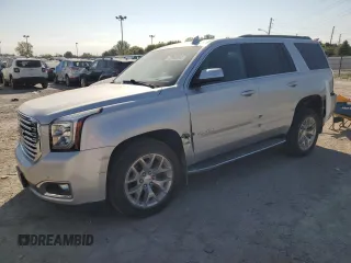 2020 GMC Yukon SLT Standard Edition with VIN 1GKS2DKC2LR197436, listed as a Copart auction lot 72049594 with 68,447 mi miles and Salvage Title. Bid and sale history available at carsss.com. Image 1.