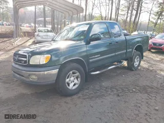2002 Toyota Tundra SR5 with VIN 5TBRT34192S285390, listed as a IAAI auction lot 41869974 with 158,839 mi miles. Bid and sale history available at carsss.com. Image 2.