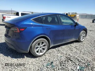 2023 Tesla Model Y Long Range with VIN 7SAYGDEE3PA106609, listed as a Copart auction lot 53839315 with 24,077 mi miles and Salvage Title. Bid and sale history available at DreamBid. Image 3.