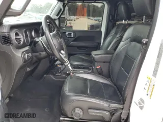 2019 Jeep Wrangler Unlimited Sahara with VIN 1C4HJXEG2KW570502, listed as a Copart auction lot 87395064 with 141,039 mi miles and Salvage Title. Bid and sale history available at carsss.com. Image 7.