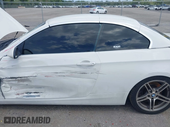 2007 BMW 3 Series 335i with VIN WBAWL73567PX46744, listed as a IAAI auction lot 39120411 with 159,526 mi miles. Bid and sale history available at carsss.com. Image 12.