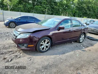 2012 Ford Fusion SE with VIN 3FAHP0HA7CR387524, listed as a Copart auction lot 62083235 with 104,698 mi miles and Salvage title. Bid and sale history available at DreamBid. Image 1.