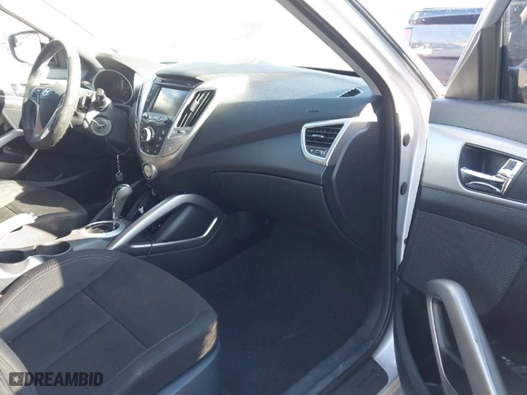 2016 Hyundai Veloster with VIN KMHTC6AD3GU297790, listed as a IAAI auction lot 41077297 with 117,239 mi miles. Bid and sale history available at carsss.com. Image 5.