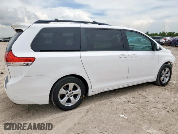 2014 Toyota Sienna LE AAS with VIN 5TDKK3DC1ES424249, listed as a Copart auction lot 62114525 with 193,301 mi miles and Salvage title. Bid and sale history available at DreamBid. Image 3.