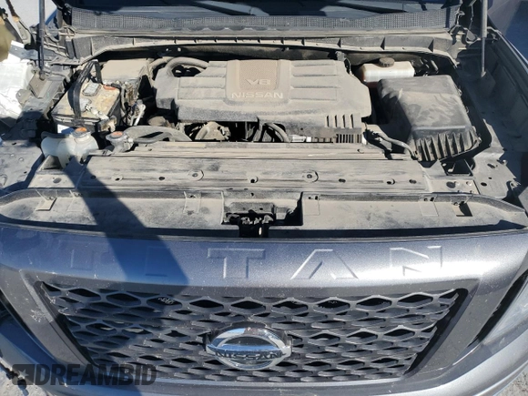 2017 Nissan Titan Platinum Reserve z VIN 1N6AA1E53HN543012, wystawiony jako Copart lot #39144854 z przebiegiem 83 008 mil mil oraz Szkoda całkowita • Salvage title. Historia ofert i sprzedaży dostępna na DreamBid. Obrazek 11.